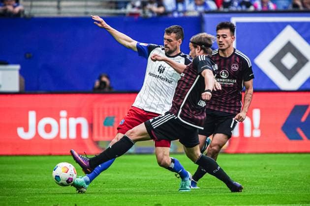 Miro Muheim Hamburger SV, 28 , Felix Lohkemper 1 FC Nuernberg, 07 GER, Hamburger SV vs 1 FC Nuernberg, Football, 2 Bundesliga, Matchday 34, Season 2023 2024, 19 05 2024 DFL REGULATIONS PROHIBIT ANY USE OF PHOTOGRAPHS AS IMAGE SEQUENCES AND OR QUASI VIDEO GER, Hamburger SV vs 1 FC Nuernberg, Football, 2 Bundesliga, Matchday 34, Season 2023 2024, 19 05 2024 Hamburg Copyright: xEibner-Pressefoto MarcelxvonxFehrnx EP_MFN