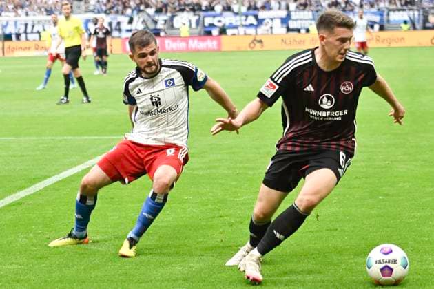GER 2 FBL,, Hamburger SV vs 1 FC Nuernberg 19 05 2024, Volksparkstadion, Hamburg, GER 2 FBL, Hamburger SV vs 1 FC Nuernberg in the picture Lukasz Poreba Hamburg 06 tries to assert himself against Florian Flick Nuernberg 06 nordphotoxGmbH xWitke nph00002