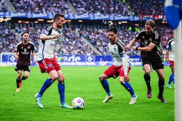 Jonas Meffert Hamburger SV, 23 , Ludovit Reis Hamburger SV, 14 , Felix Lohkemper 1 FC Nuernberg, 07 GER, Hamburger SV vs 1 FC Nuernberg, Football, 2 Bundesliga, Matchday 34, Season 2023 2024, 19 05 2024 DFL REGULATES PROHIBIT ANY USE OF PHOTOGRAPHS AS IMAGE SEQUENCES AND OR QUASI VIDEO GER, Hamburger SV vs 1 FC Nuernberg, Football, 2 Bundesliga, Matchday 34, Season 2023 2024, 19 05 2024 Hamburg Copyright: xEibner-Pressefoto MarcelxvonxFehrnx EP_MFN