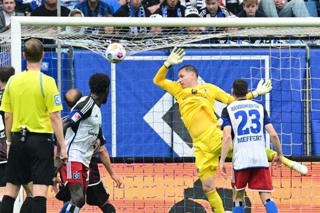 Soccer I Men I 2023 2024 I 2 Bundesliga I 34 Matchday I Hamburger SV 1 FC Nürnberg I 19 5 2024 h19 stretches as a precaution but the ball goes over Hamburg Volksparkstadion Hamburg Germany Copyright: xLobeca AndreasxHannigx