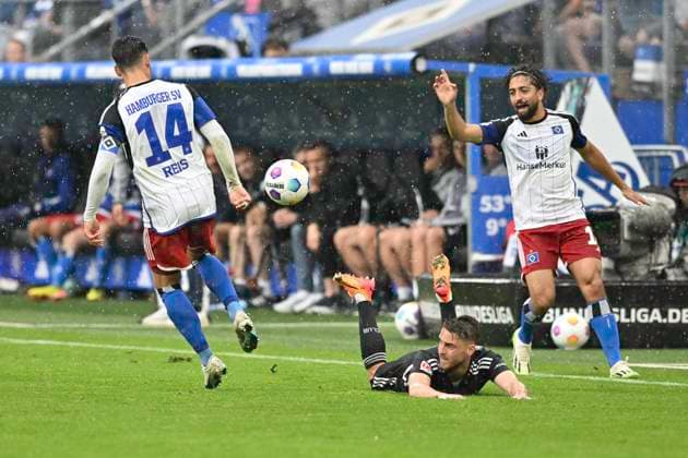 GER 2 FBL,, Hamburger SV vs 1 FC Nuernberg 19 05 2024, Volksparkstadion, Hamburg, GER 2 FBL, Hamburger SV vs 1 FC Nuernberg in the picture Ludovit Reis Hamburg 14 tries to assert himself against Lukas Schleimer Nuernberg 36 nordphotoxGmbH xWitke nph00002