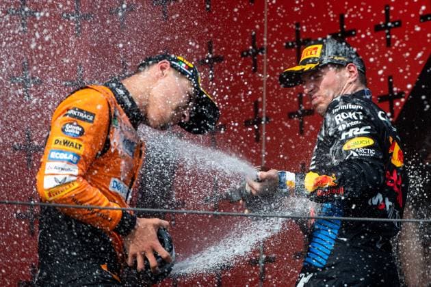 Max Verstappen Oracle Red Bull Racing, 01 celebrates victory on the podium at the podium ceremony and splashes champagne with Lando Norris McLaren Formula 1 Team, 04 , ITA, Formula 1 World Championship, Grand Prix Emilia Romagna Imola, Autodromo Enzo e Dino Ferrari, Race, 19 05 2024 ITA, Formula 1 World Championship, Grand Prix Emilia Romagna Imola, Autodromo Enzo e Dino Ferrari, Race, 19 05 2024 Imola Copyright: xEibner-Pressefoto Memmlerx EP_MMR