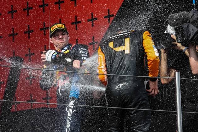 VERSTAPPEN Max (ned), Red Bull Racing RB20, portrait NORRIS Lando (gbr), McLaren F1 Team MCL38, portrait podium during the Formula 1 MSC Cruises Gran Premio del Made in Italy e Dell™Emilia-Romagne 2024, 7th round of the 2024 Formula One World Championship, WM, Weltmeisterschaft from May 17 to 19, 2024 on the Autodromo Enzo e Dino Ferrari, in Imola, Italy - F1 - EMILIA-ROMAGNA GRAND PRIX 2024 DPPI Panoramic  240519_R07_EMR_DP_XB3_2852