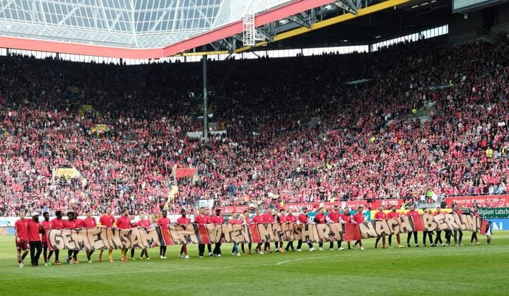 Football 2 Bundesliga Season 2023 24 Kaiserslautern Fritz Walter Stadion 20 04 2024 1 FC Kaiserslautern fck Eintracht Braunschweig bs 5 0 With FCK team after the match with a banner Football 2 Bundesliga 1 FC Kaiserslautern