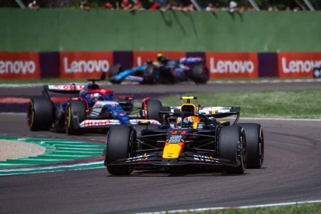 Sergio Checo Perez Oracle Red Bull Racing, 11 in RedBull RB20 ahead of Daniel Ricciardo Visa Cash App RB Formula One Team Racing Bulls, 03 , ITA, Formula 1 World Championship, Grand Prix Emilia Romagna Imola, Autodromo Enzo e Dino Ferrari, Race, 19 05 2024 ITA, Formula 1 World Championship, Grand Prix Emilia Romagna Imola, Autodromo Enzo e Dino Ferrari, Race, 19 05 2024 Imola Copyright: xEibner-Pressefoto Memmlerx EP_MMR