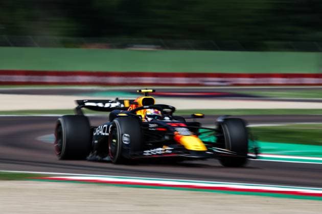 11 PEREZ Sergio (mex), Red Bull Racing RB20, action during the Formula 1 MSC Cruises Gran Premio del Made in Italy e Dell™Emilia-Romagne 2024, 7th round of the 2024 Formula One World Championship, WM, Weltmeisterschaft from May 17 to 19, 2024 on the Autodromo Enzo e Dino Ferrari, in Imola, Italy - F1 - EMILIA-ROMAGNA GRAND PRIX 2024 DPPI Panoramic  240519_R07_EMR_DP_XB3_2450