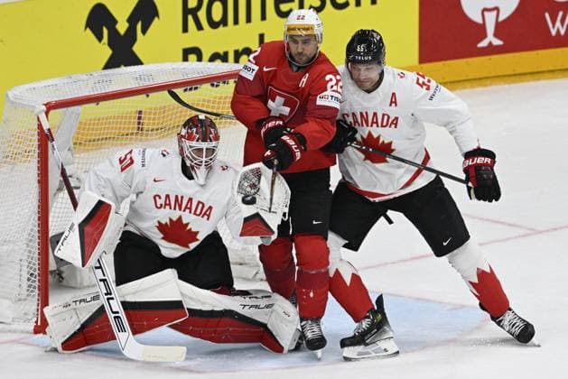 (L-R) Goalkeeper of Canada Jordan Binnington, Nino Niederreiter of Switzerland and Colton Parayko of Canada in action during the 2024 IIHF World Championship, WM, Weltmeisterschaft group A match Switzerland vs Canada in Prague, Czech Republic, May 19, 2024. (CTKxPhoto VitxSimanek) CTKPhotoP2024051906761  CTKPhotoP2024051906761