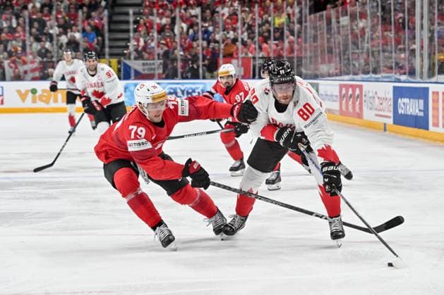 PRAGUE, CZECH REPUBLIC MAY 19 Pierre Luc Dubois of Canada defends the puck from Calvin Thurkauf of Switzerland during the preliminary round match between Switzerland and Canada at Prague Arena Prague Prague Prague Arena Czech Republic on May 19, 2024 in Prague, Czech Republic Prague Prague Arena Czech Republic Copyright: xJustPictures.ch AndreaxBrancax jp-en-EuSpIm-AB_19052024_AAB_7979