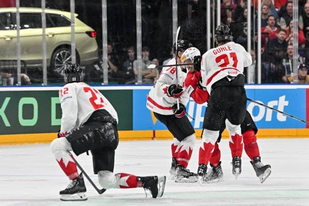 PRAGUE, CZECH REPUBLIC MAY 19 Kevin Fiala of Switzerland gets hit by Kaiden Guhle of Canada during the preliminary round match between Switzerland and Canada at Prague Arena on May 19, 2024 in Prague, Czech Republic Prague Prague Arena Czech Republic Copyright: xJustPictures.ch AndreaxBrancax jp-en-EuSpIm-AB_19052024_AAB_8257