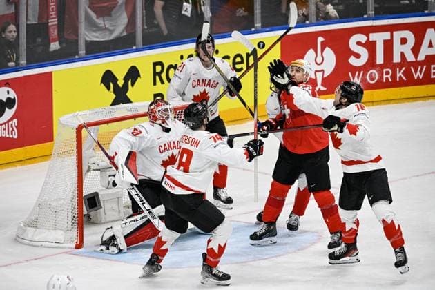 (L-R) Goalkeeper of Canada Jordan Binnington, Damon Severson and Kaiden Guhle of Canada, Nino Niederreiter of Switzerland and Dawson Mercer of Canada in action during the 2024 IIHF World Championship, WM, Weltmeisterschaft group A match Switzerland vs Canada in Prague, Czech Republic, May 19, 2024. (CTKxPhoto VitxSimanek) CTKPhotoP2024051907346  CTKPhotoP2024051907346