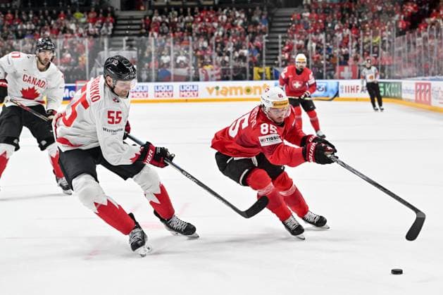 PRAGUE, CZECH REPUBLIC MAY 19 Sven Andrighetto of Switzerland fights for the puck against Colton Parayko during the preliminary round match between Switzerland and Canada at Prague Arena on May 19, 2024 in Prague Prague, Czech Republic Prague Prague Arena Czech Republic Copyright: xJustPictures.ch AndreaxBrancax jp-en-EuSpIm-AB_19052024_AAB_9334