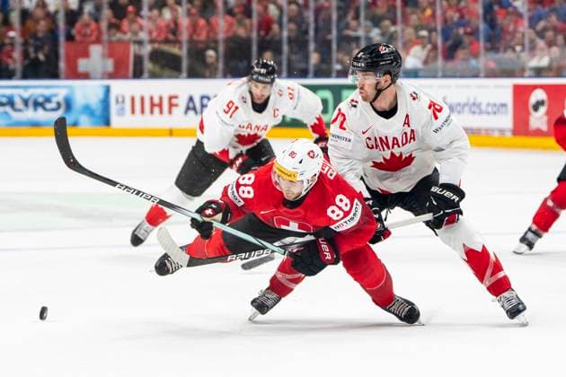 PRAGUE, CZECH REPUBLIC MAY 19 Christoph Bertschy of Switzerland L tripped by Damon Severson of Canada R during the preliminary round match between Switzerland and Canada at Prague Arena on May 19, 2024 in Prague, Czech Republic Prague Prague Arena Czech Republic Copyright: xJustPictures.ch JarixPestelaccix jp-en-EuSpIm-JP4_JAR_Switzerland_Canada_19May2024_250