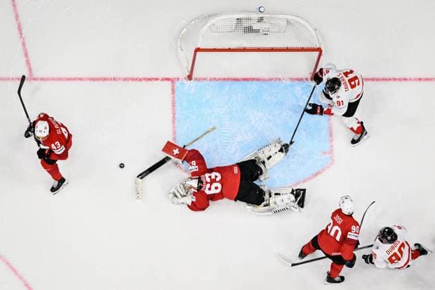 (L-R) Andrea Glauser of Switzerland, goalkeeper of Switzerland Leonardo Genoni, John Tavares of Canada, Roman Josi of Switzerland and Pierre-Luc Dubois of Canada during the 2024 IIHF World Championship, WM, Weltmeisterschaft group A match Switzerland vs Canada in Prague, Czech Republic, May 19, 2024. (CTKxPhoto VitxSimanek) CTKPhotoP2024051908037  CTKPhotoP2024051908037