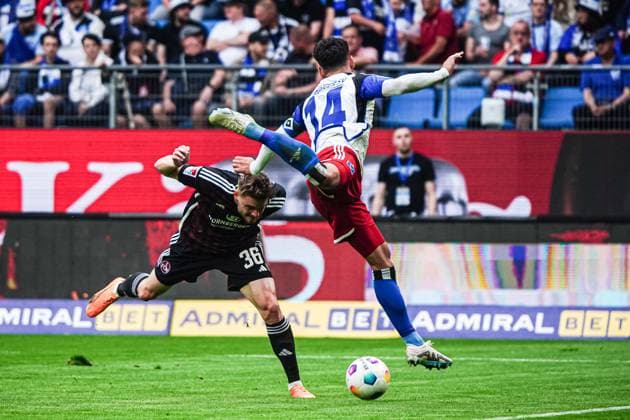 Lukas Schleimer 1 FC Nuernberg, 36 , Ludovit Reis Hamburger SV, 14 GER, Hamburger SV vs 1 FC Nuernberg, Football, 2 Bundesliga, Matchday 34, Season 2023 2024, 19 05 2024 DFL REGULATIONS PROHIBIT ANY USE OF PHOTOGRAPHS AS IMAGE SEQUENCES AND OR QUASI VIDEO GER, Hamburger SV vs 1 FC Nuernberg, Football, 2 Bundesliga, Matchday 34, Season 2023 2024, 19 05 2024 Hamburg Copyright: xEibner-Pressefoto MarcelxvonxFehrnx EP_MFN