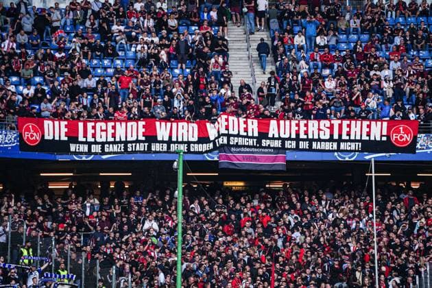 Banner Fans Ultras 1 FC Nuernberg GER, Hamburger SV vs 1 FC Nuernberg, Football, 2 Bundesliga, Matchday 34, Season 2023 2024, 19 05 2024 DFL REGULATIONS PROHIBIT ANY USE OF PHOTOGRAPHS AS IMAGE SEQUENCES AND OR QUASI VIDEO GER, Hamburger SV vs 1 FC Nuernberg, Football, 2 Bundesliga, Matchday 34, Season 2023 2024, 19 05 2024 Hamburg Copyright: xEibner-Pressefoto MarcelxvonxFehrnx EP_MFN
