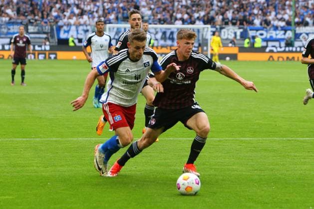 Football I Men I 2 Bundesliga l Hamburger SV 1 FC Nürnberg 34 Matchday I 19 05 2024 Season 2023 2024 Finn Jeltsch 1 FC Nürnberg Miro Muheim Hamburger SV fighting for the ball Copyright: FernandoxSoares