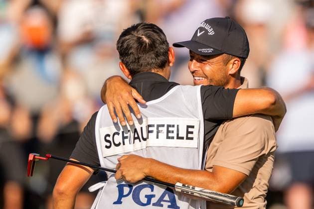 240519 Xander Schauffele of the United States celebrate with his caddie after winning the 2024 PGA Championship Golf Tournament on May 19, 2024 in Louisville Photo Petter Arvidson BILDBYRAN kod PA PA0811 golf pga championship bbeng  Copyright: PETTERxARVIDSON BB240519PA185