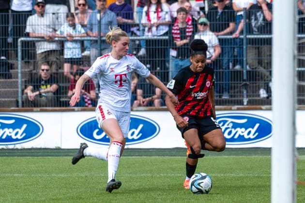 Soccer Google Pixel Womens Bundesliga, Season 2023 2024, Matchday 22, 1 FC Koeln Eintracht Frankfurt on 20 05 2024 at Franz Kremer Stadium in Koeln duel between Sofie Vendelbo Laursen 1 FC Koeln, 02 and Shekiera Martinez Eintracht Frankfurt, 09 Important note In accordance with the regulations of the DFL German Football League and the DFB German Football Association, it is prohibited to utilize or have utilized photographs taken in the stadium and or of the match in the form of sequential images and or video-like photo series Foto Kirchner Media TH Copyright: xKirchner-Media THx