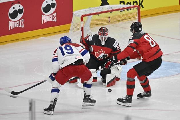 Czech Republic vs Canada group A, match of 2024 IIHF World Championship, WM, Weltmeisterschaft in Prague, Czech Republic, on May 21, 2024. From left Czech Jakub Flek, Jordan Binnington, goalie, Pierre-Luc Dubois, both of Canada. (CTKxPhoto VitxSimanek) CTKPhotoP2024052105973  CTKPhotoP2024052105973