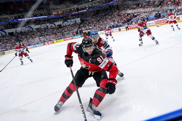 PRAGUE, CZECH REPUBLIC MAY 21 John Tavares of Canada protects the puck along the boards from David Tomasek during the preliminary round match between Canada and Czechia at Prague Arena on May 21, 2024 in Prague Prague, Czech Republic Prague Prague Arena Czech Republic Copyright: xJustPictures.ch AndreaxBrancax jp-en-EuSpIm-AB_21052024_DSC_0264