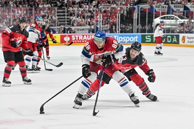 PRAGUE, CZECH REPUBLIC MAY 21 David Pastrnak of Czechia protects the puck from Brandon Tanev of Canada during the preliminary round match between Canada and Czechia at Prague Arena on May 21, 2024 in Prague, Czech Republic Prague Prague Arena Czech Republic Copyright: xJustPictures.ch AndreaxBrancax jp-en-EuSpIm-AB_21052024_AAB_3621