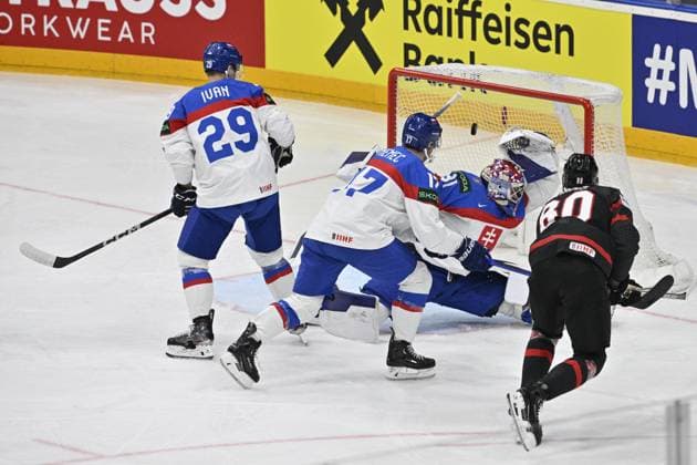 Canada vs Slovakia quarter-final match of the 2024 IIHF World Championship, WM, Weltmeisterschaft in Prague, Czech Republic, on May 23, 2024. L-R Michal Ivan (SVK), Simon Nemec (SVK), goalkeeper Samuel Hlavaj (SVK), scoring Pierre-Luc Dubois (CAN). (CTKxPhoto VitxSimanek) CTKPhotoP2024052306388  CTKPhotoP2024052306388