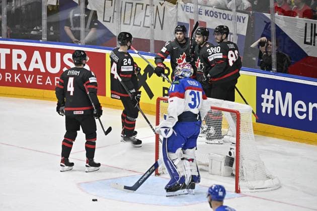 Canada vs Slovakia quarter-final match of the 2024 IIHF World Championship, WM, Weltmeisterschaft in Prague, Czech Republic, on May 23, 2024. Canada players celebrate after scoring a goal against goalkeeper Samuel Hlavaj (SVK, front). Canada s goal scorer Pierre-Luc Dubois, right. (CTKxPhoto VitxSimanek) CTKPhotoP2024052306406  CTKPhotoP2024052306406