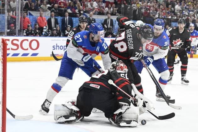 Canada vs Slovakia quarter-final match of the 2024 IIHF World Championship, WM, Weltmeisterschaft in Prague, Czech Republic, on May 23, 2024. L-R Marek Hrivik (SVK), goalkeeper Jordan Binnington (CAN), Damon Severson (CAN), Peter Cehlarik (SVK). (CTKxPhoto MichalxKamaryt) CTKPhotoP2024052306620  CTKPhotoP2024052306620