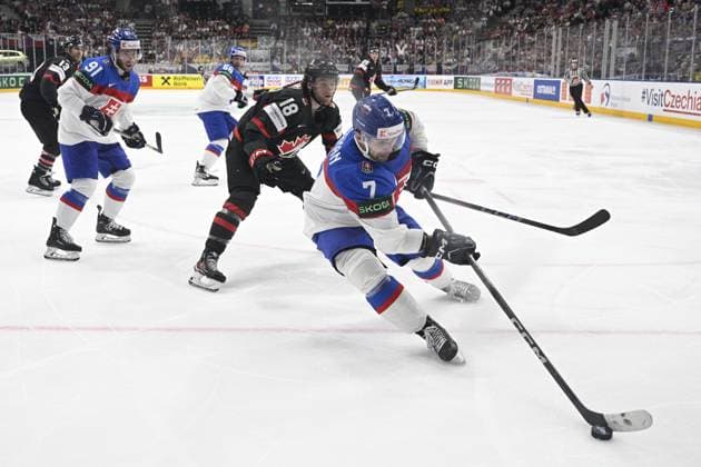 Canada vs Slovakia quarter-final match of the 2024 IIHF World Championship, WM, Weltmeisterschaft in Prague, Czech Republic, on May 23, 2024. L-R Matus Sukel (SVK), Dawson Mercer (CAN), Mario Grman (SVK). (CTKxPhoto MichalxKamaryt) CTKPhotoP2024052307108  CTKPhotoP2024052307108