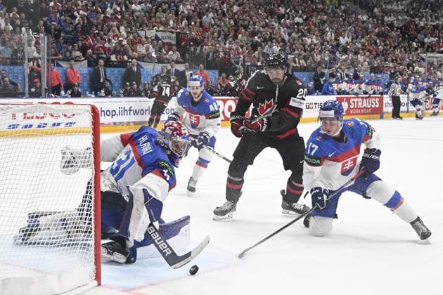 Canada vs Slovakia quarter-final match of the 2024 IIHF World Championship, WM, Weltmeisterschaft in Prague, Czech Republic, on May 23, 2024. L-R goalkeeper Samuel Hlavaj (SVK), Viliam Cacho (SVK), Nick Paul (CAN), Simon Nemec (SVK). (CTKxPhoto MichalxKamaryt) CTKPhotoP2024052307238  CTKPhotoP2024052307238
