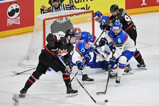 Canada vs Slovakia quarter-final match of the 2024 IIHF World Championship, WM, Weltmeisterschaft in Prague, Czech Republic, on May 23, 2024. L-R Pierre-Luc Dubois (CAN), goalkeeper Samuel Hlavaj (SVK), Simon Nemec (SVK), Michal Ivan (SVK), Lukas Cingel (SVK), John Tavares (CAN). (CTKxPhoto VitxSimanek) CTKPhotoP2024052307534  CTKPhotoP2024052307534
