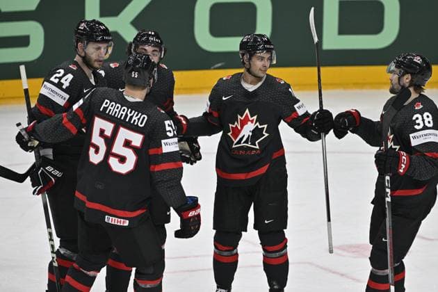 Canada vs Slovakia quarter-final match of the 2024 IIHF World Championship, WM, Weltmeisterschaft in Prague, Czech Republic, on May 23, 2024. Canada players celebrate after scoring a goal. Second right is goal scorer Dylan Guenther of Canada. (CTKxPhoto VitxSimanek) CTKPhotoP2024052307770  CTKPhotoP2024052307770