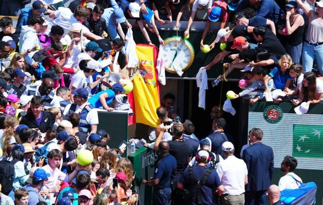 Rafa Nadal signs autographs for fans after practice on Suzanne Lenglen Court French Open Tennis, Saturday Practice and Qualifying, Tennis, Roland Garros, Paris, France - 25 May 2024  Copyright: xJavierxGarcia Shutterstockx 14496646e