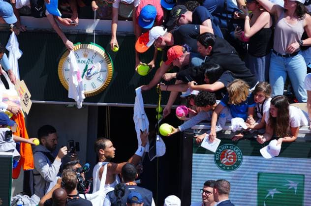 Rafa Nadal signs autographs for fans after practice on Suzanne Lenglen Court French Open Tennis, Saturday Practice and Qualifying, Tennis, Roland Garros, Paris, France - 25 May 2024  Copyright: xJavierxGarcia Shutterstockx 14496646b