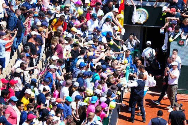 Rafa Nadal signs autographs for fans after practice on Suzanne Lenglen Court French Open Tennis, Saturday Practice and Qualifying, Tennis, Roland Garros, Paris, France - 25 May 2024  Copyright: xJavierxGarcia Shutterstockx 14496646aa