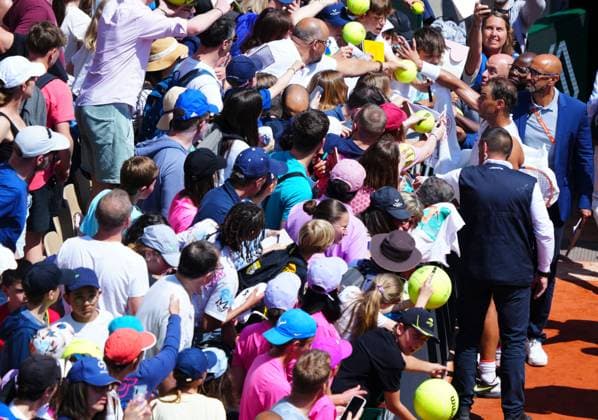 Rafa Nadal appeals for fans to stand back after a crush from fans clamouring to get autographs after practice on Suzanne Lenglen Court French Open Tennis, Saturday Practice and Qualifying, Tennis, Roland Garros, Paris, France - 25 May 2024  Copyright: xJavierxGarcia Shutterstockx 14496646r
