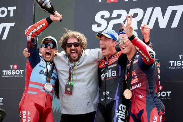 Sport Bilder des Tages 25th May 2024; Circuit de Barcelona, Barcelona, Catalonia, Spain; 2024 MotoGP of Catalunya Qualifying Day; sprint race podium ceremony, (L-R) 2nd place Marc Marquez of the Gresini Racing, spanish singer Antonio Orozco, 1st place Aleix Espargaro of the Aprilia Racing and 3rd place Pedro Acosta of the Red Bull GasGas Tech3 celebrate after the sprint race  ActionPlus12647094 PabloxGuillen