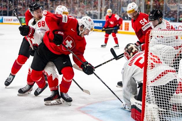PRAGUE, CZECH REPUBLIC MAY 25 Sven Senteler of Switzerland C against Andrew Mangiapane of Canada L and goalkeeper Jordan Binnington of Canada R during the 2024 IIHF Ice Hockey World Championship Czechia Semifinal match between Canada and Switzerland at Prague Arena on May 25, 2024 in Prague, Czech Republic Prague Prague Arena Czech Republic Copyright: xJustPictures.ch JarixPestelaccix jp-en-EuSpIm-JP4_JAR_Canada_Switzerland_25May_2024076