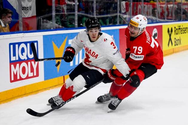 L-R Olen Zellweger (CAN) and Calvin Thurkauf (SUI) in action during the 2024 IIHFWorld Championship, semi-final match Canada vs Switzerland, in Prague, Czech Republic, on May 25, 2024. (CTKxPhoto OndrejxDeml) CTKPhotoP2024052505827  CTKPhotoP2024052505827