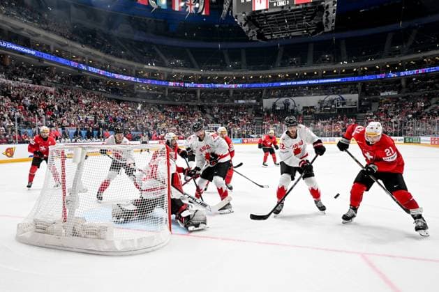 PRAGUE, CZECH REPUBLIC MAY 25 Kevin Fiala of Switzerland in action against Dylan Cozens of Canada and goalkeeper Jordan Binnington of Canada during the 2024 IIHF Ice Hockey World Championship Czechia Semifinal match between Canada and Switzerland at Prague Arena on May 25, 2024 in Prague, Czech Republic Prague Prague Arena Czech Republic Copyright: xJustPictures.ch AndreaxBrancax jp-en-EuSpIm-AB_25052024_DSC_6000