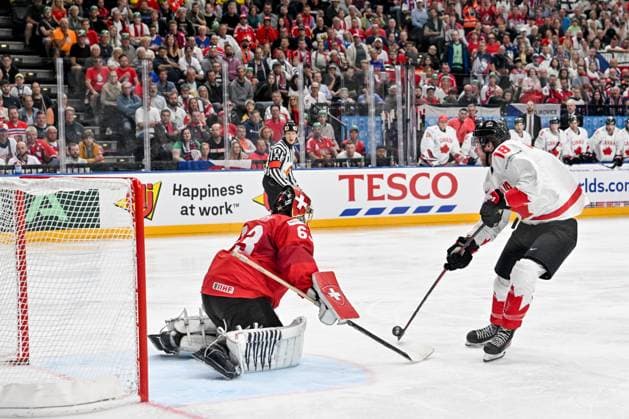 PRAGUE, CZECH REPUBLIC MAY 25 Dawson Mercer of Canada tries to score against goalkeeper Leonardo Genoni of Switzerland during the 2024 IIHF Ice Hockey World Championship Czechia Semifinal match between Canada and Switzerland at Prague Arena on May 25, 2024 in Prague, Czech Republic Prague Prague Arena Czech Republic Copyright: xJustPictures.ch AndreaxBrancax jp-en-EuSpIm-AB_25052024_AAB_4764