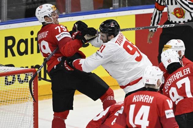L-R Calvin Thurkauf (SUI) and John Tavares (CAN) in skirmish during the 2024 IIHF World Championship, WM, Weltmeisterschaft semi-final match Canada vs Switzerland, in Prague, Czech Republic, on May 25, 2024. (CTKxPhoto MichalxKamaryt) CTKPhotoP2024052506223  CTKPhotoP2024052506223