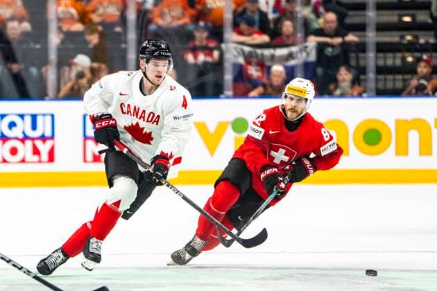 PRAGUE, CZECH REPUBLIC MAY 25 Bowen Byram of Canada L against Christoph Bertschy of Switzerland R during the 2024 IIHF Ice Hockey World Championship Czechia Semifinal match between Canada and Switzerland at Prague Arena on May 25, 2024 in Prague, Czech Republic Prague Prague Arena Czech Republic Copyright: xJustPictures.ch JarixPestelaccix jp-en-EuSpIm-JP4_JAR_Canada_Switzerland_25May_2024136