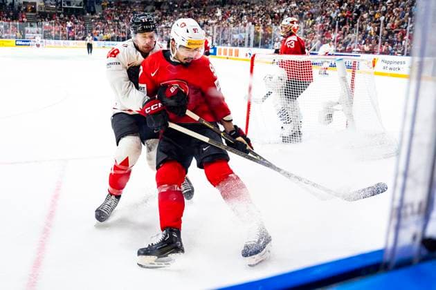 PRAGUE, CZECH REPUBLIC MAY 25 Andrew Mangiapane of Canada L against Jonas Siegenthaler of Switzerland during the 2024 IIHF Ice Hockey World Championship Czechia Semifinal match between Canada and Switzerland at Prague Arena on May 25, 2024 in Prague, Czech Republic Prague Prague Arena Czech Republic Copyright: xJustPictures.ch JarixPestelaccix jp-en-EuSpIm-JP4_JAR_Canada_Switzerland_25May_2024139