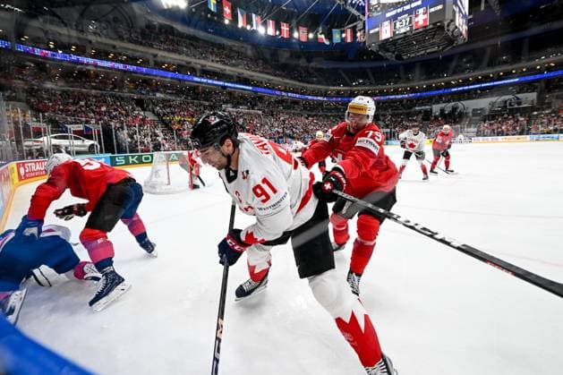PRAGUE, CZECH REPUBLIC MAY 25 Calvin Thurkauf of Switzerland checks John Tavares of Canada along the boards during the 2024 IIHF Ice Hockey World Championship Czechia Semifinal match between Canada and Switzerland at Prague Arena on May 25, 2024 in Prague, Czech Republic Prague Prague Arena Czech Republic Copyright: xJustPictures.ch AndreaxBrancax jp-en-EuSpIm-AB_25052024_DSC_6689