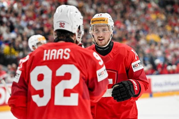 PRAGUE, CZECH REPUBLIC MAY 25 Dean Kukan of Switzerland talks with Gaetan Haas of Switzerland during the 2024 IIHF Ice Hockey World Championship Czechia Semifinal match between Canada and Switzerland at Prague Arena on May 25, 2024 in Prague, Czech Republic Prague Prague Arena Czech Republic Copyright: xJustPictures.ch AndreaxBrancax jp-en-EuSpIm-AB_25052024_AAB_4913