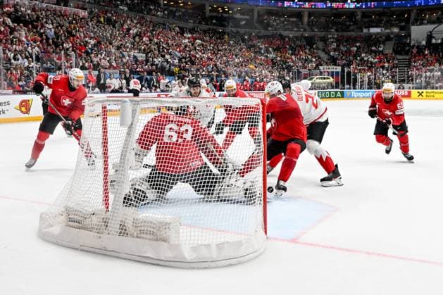 PRAGUE, CZECH REPUBLIC MAY 25 Andrea Glauser of Switzerland scores in his own goal during the 2024 IIHF Ice Hockey World Championship Czechia Semifinal match between Canada and Switzerland at Prague Arena on May 25, 2024 in Prague, Czech Republic Prague Prague Arena Czech Republic Copyright: xJustPictures.ch AndreaxBrancax jp-en-EuSpIm-AB_25052024_DSC_6852