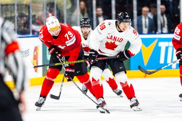 PRAGUE, CZECH REPUBLIC MAY 25 Calvin Thurkauf of Switzerland L against Connor Bedard of Canada R during the 2024 IIHF Ice Hockey World Championship Czechia Semifinal match between Canada and Switzerland at Prague Arena on May 25, 2024 in Prague, Czech Republic Prague Prague Arena Czech Republic Copyright: xJustPictures.ch JarixPestelaccix jp-en-EuSpIm-JP4_JAR_Canada_Switzerland_25May_2024164