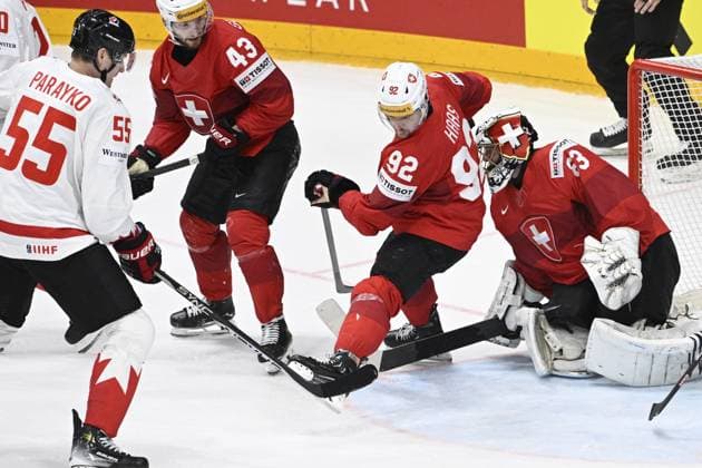 L-R Colton Parayko (CAN), Andrea Glauser (SUI), Gaetan Haas (SUI) and goalkeeper Leonardo Genoni (SUI) in action during the 2024 IIHF World Championship, WM, Weltmeisterschaft semi-final match Canada vs Switzerland, in Prague, Czech Republic, on May 25, 2024. (CTKxPhoto MichalxKamaryt) CTKPhotoP2024052506736  CTKPhotoP2024052506736