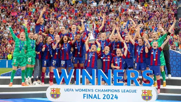 the FC Barcelona, Barca players celebrate with the trophy after winning, UEFA Women s Champions League 2023 2024 - Final, FC Barcelona vs Olympique Lyonnais, Estadio de San Mames, May 25, 2024, Bilbao, Spain.